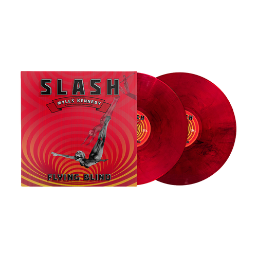 The latest album from Slash, 'Flying Blind', in vinyl format. The cover shows a figure diving against a circular orange, yellow, and red pattern.